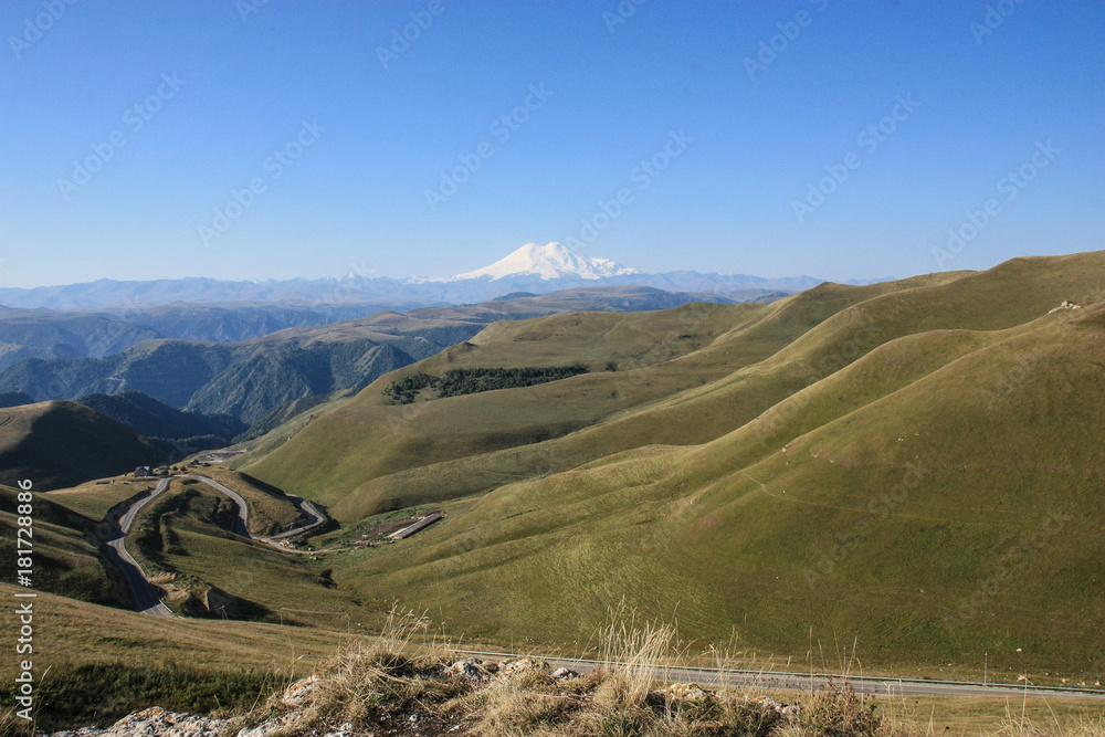 Valley in Caucasus mountains with view at Elbrus mountain, Russia
