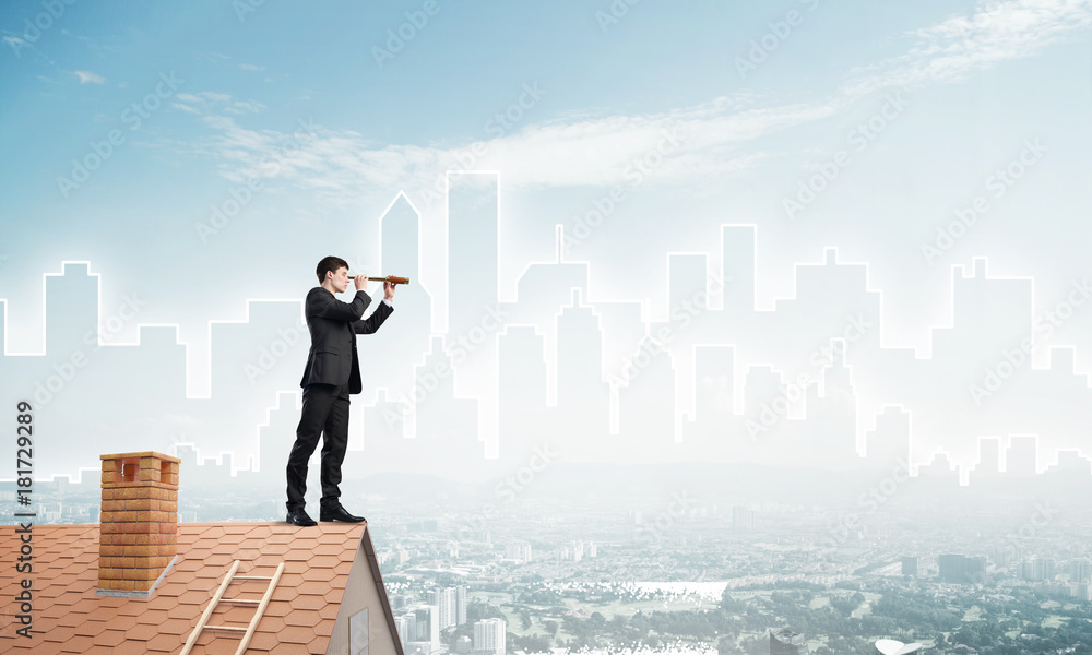 Engineer man standing on roof and looking in spyglass. Mixed media Engineer man standing on roof and looking in spyglass. Mixed media