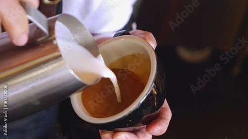 how to make coffee latte art by barista in cafe