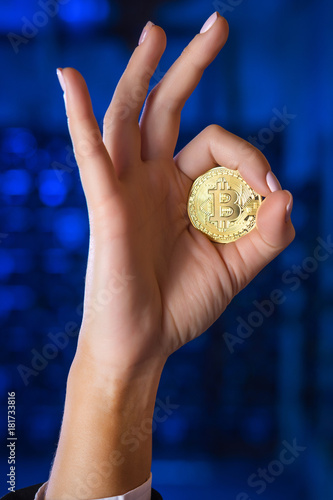 hand bitcoin money