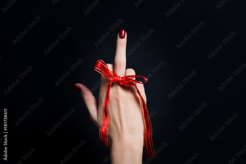 Fuck you sign as a gift by hand isolated on black background and place for signature Stock Photo Adobe Stock