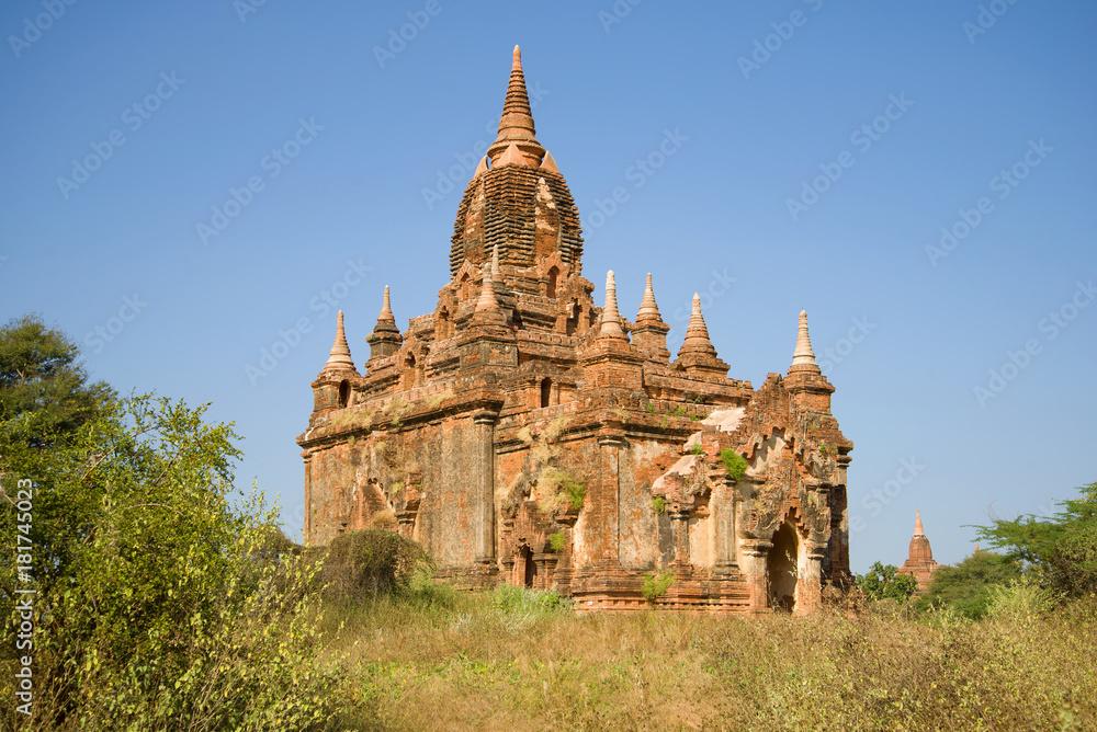 Ancient Buddhist pagoda on a sunny day. Old Bagan, Myanmar