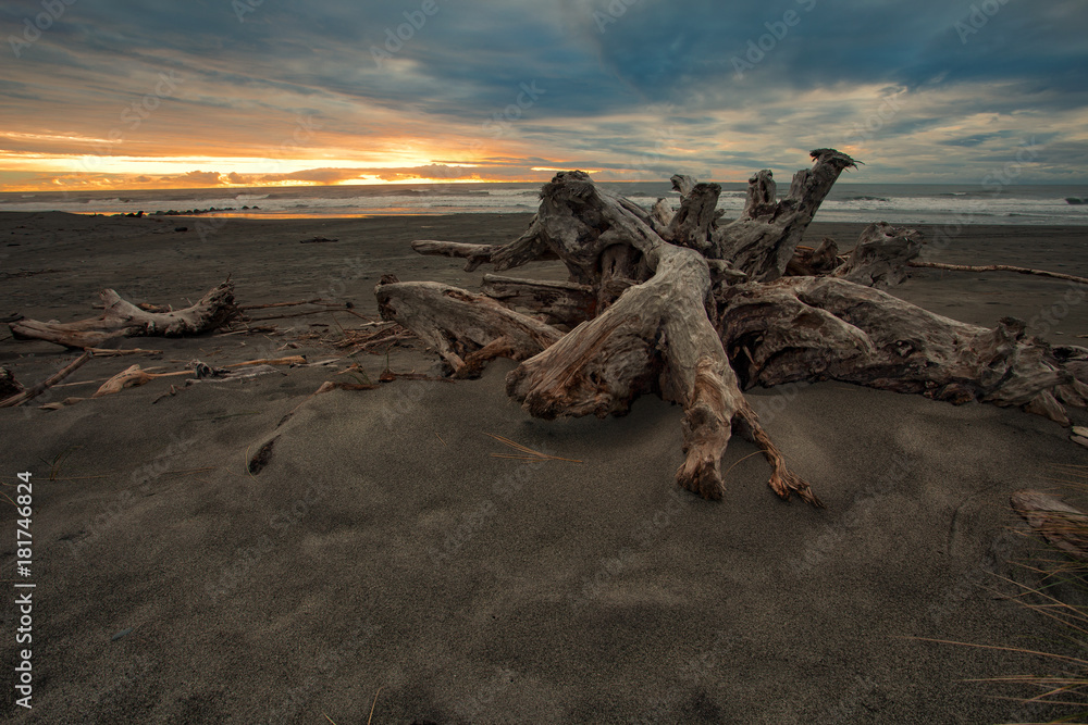 beautiful abandoned sea beach and  sun set sky at hokitika west coast southland of new zealand
