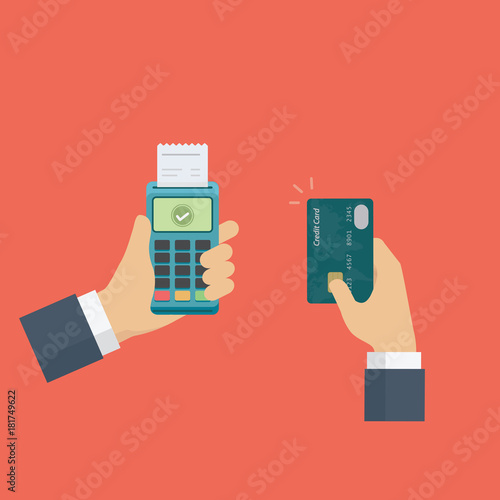 Hand holding edc terminal and credit card. credit card payment
