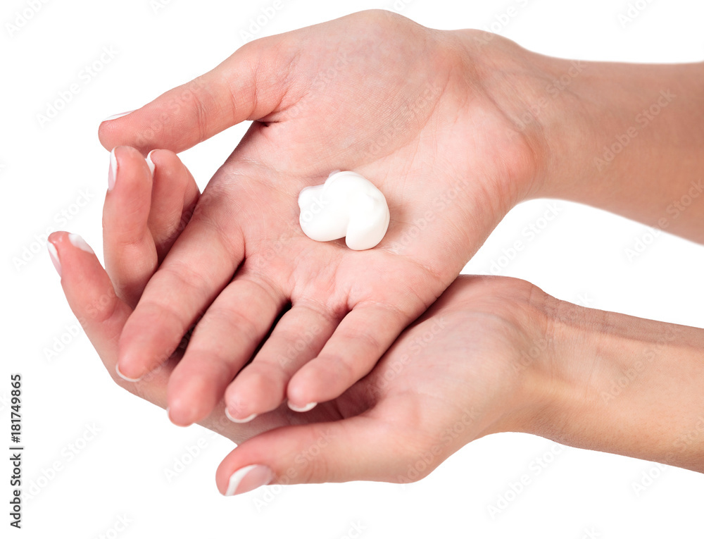 Closeup shot of beautiful woman's hands with cream, isolated on white background Closeup shot of beautiful woman's hands with cream, isolated on white background