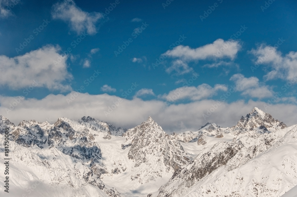 Scenic view of winter mountains under the sky