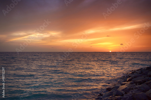 Sunset in the Maldives. Beautiful colorful sunset over the ocean at Maafushi island Maldives