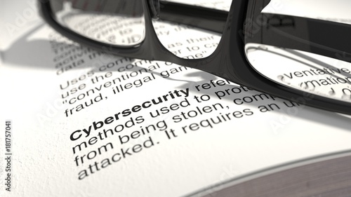 The definition of cybersecurity from a dictionary closeup