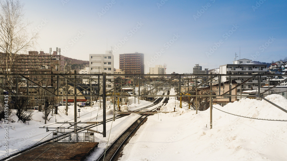 The railroad heading towards the town of Otaru is covered with snow. After a blizzard hokkaido region The journey was more difficult, including the train was canceled