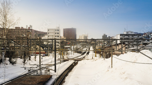 The railroad heading towards the town of Otaru is covered with snow. After a blizzard hokkaido region The journey was more difficult  including the train was canceled