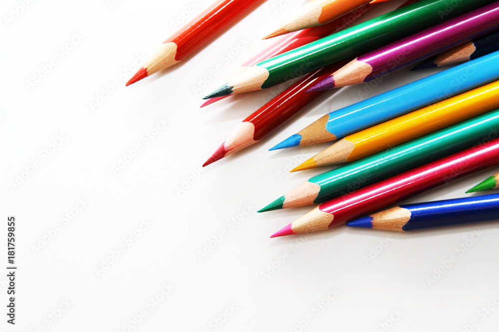 Colored pencil as wallpaper / A colored pencil is an art medium constructed of a narrow, pigmented core encased in a wooden cylindrical case.