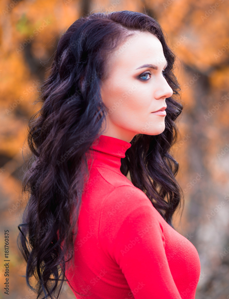 Pretty brunette in an autumn forest Pretty brunette in an autumn forest