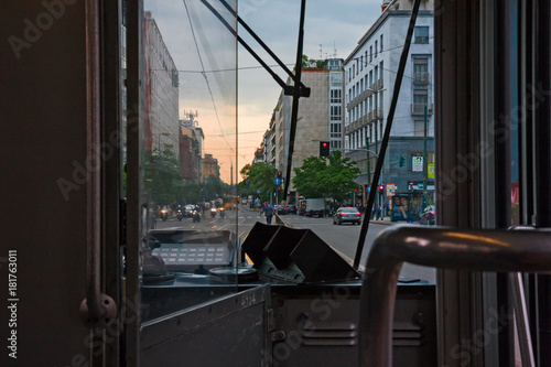 Milan downtown street view from inside its trams