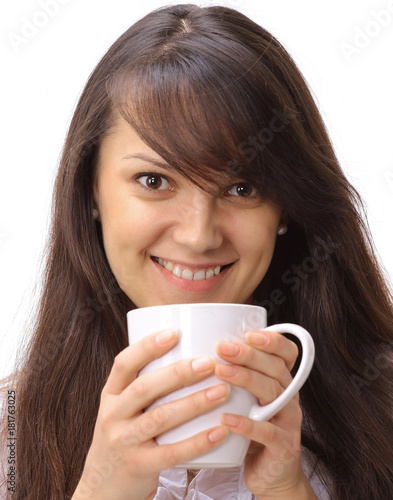 portrait of beautiful young woman holding a Cup of tea
