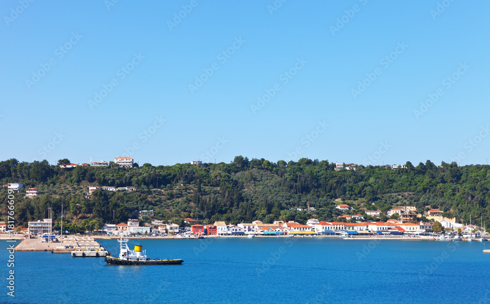 Greece. View from the sea to the embankment of the coastal village of Katakolon