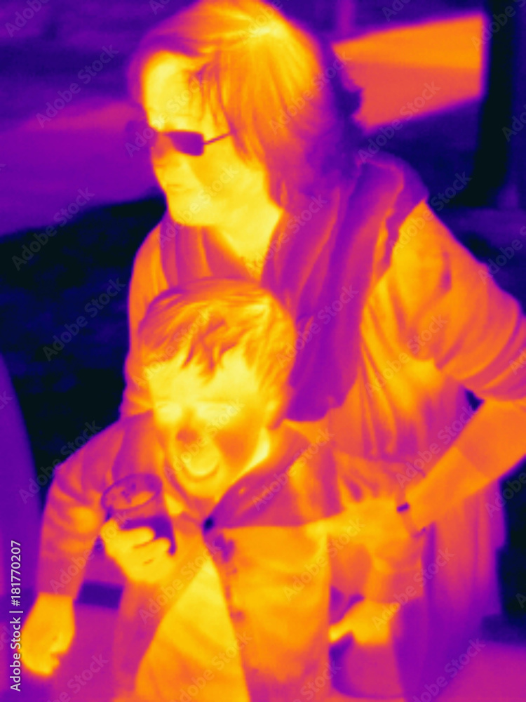 Thermal photograph of mother and son in park Thermal photograph of mother and son in park