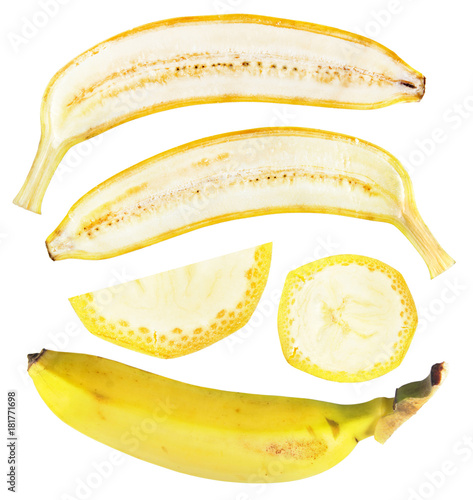 Unpeeled, cut in half and slice of yellow banana isolated on white background