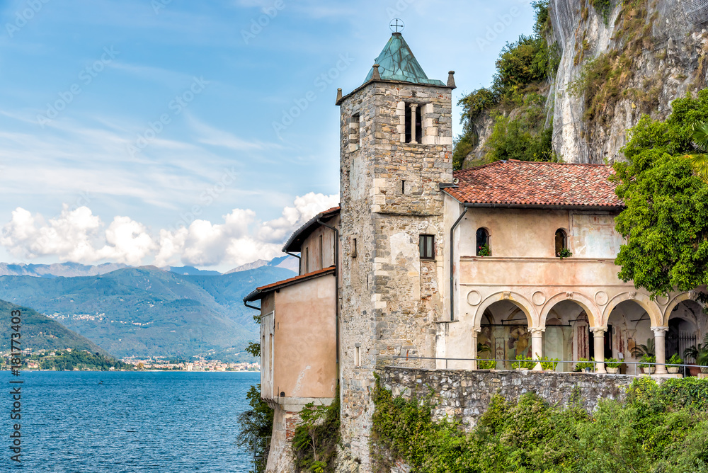 Hermitage of Santa Caterina del Sasso, is rock face directly overhanging the lake Maggiore, Leggiuno, Italy