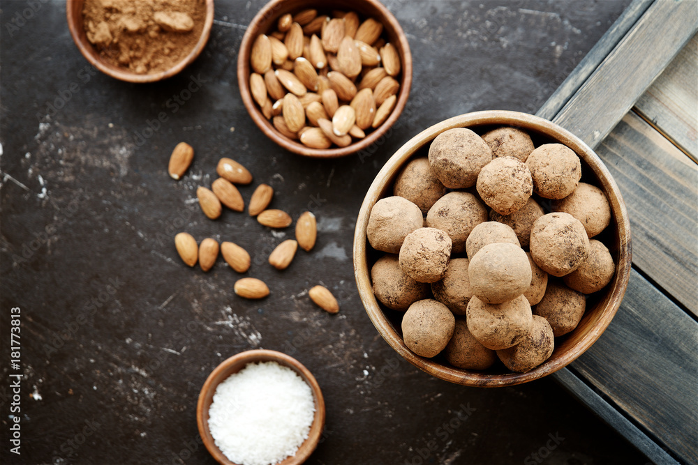 Raw candies from dates, cocoa, coconut and nuts. Vegetarian food. The concept of a healthy diet
Raw candies from dates, cocoa, coconut and nuts. Vegetarian food. The concept of a healthy diet