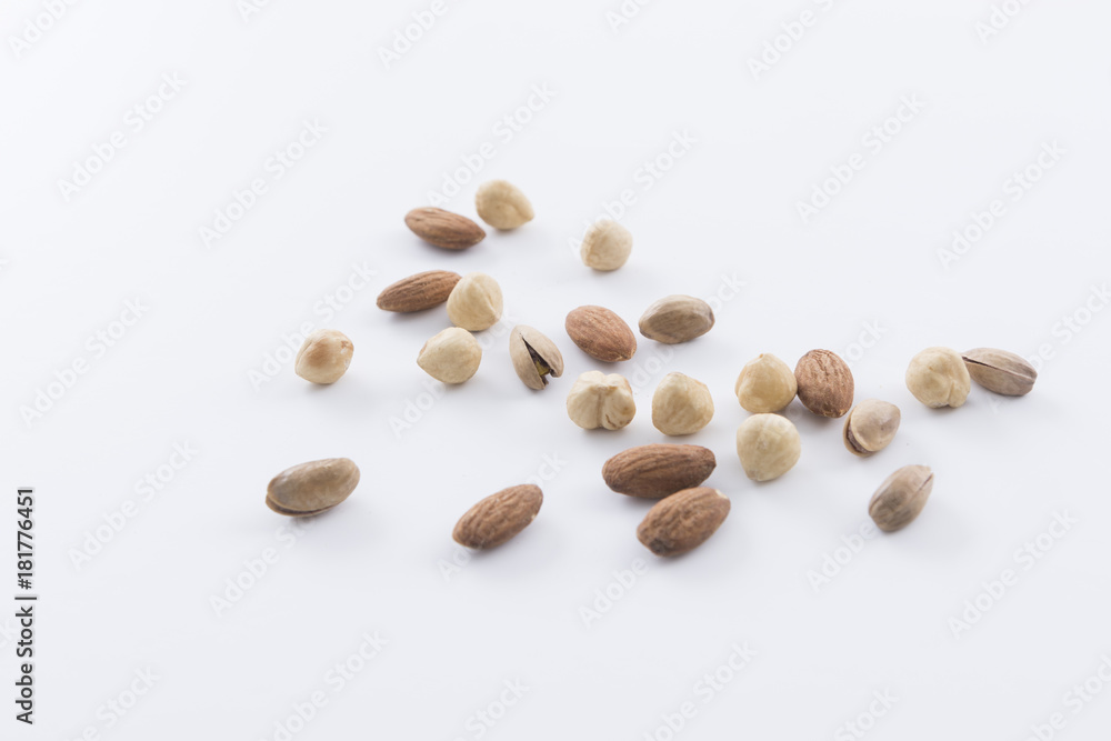 Gray background isolated mixed nuts Gray background isolated mixed nuts