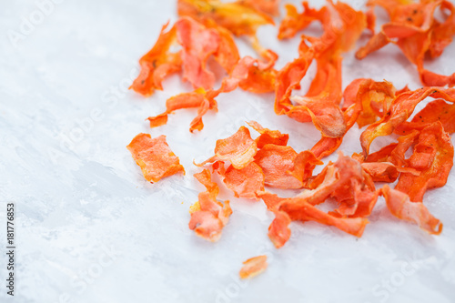 Dried carrots are healthy chips with herbs.