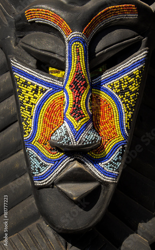 African wooden ethnic tribal ritual mask decorated beards.