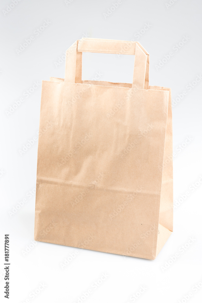 Brown color recycled paper bag isolated on white, recyclable concept Brown color recycled paper bag isolated on white, recyclable concept