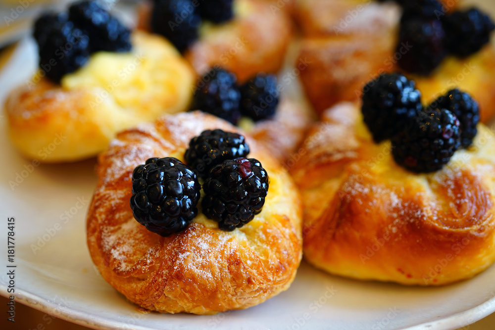 Danish pastry with blackberries on top Danish pastry with blackberries on top