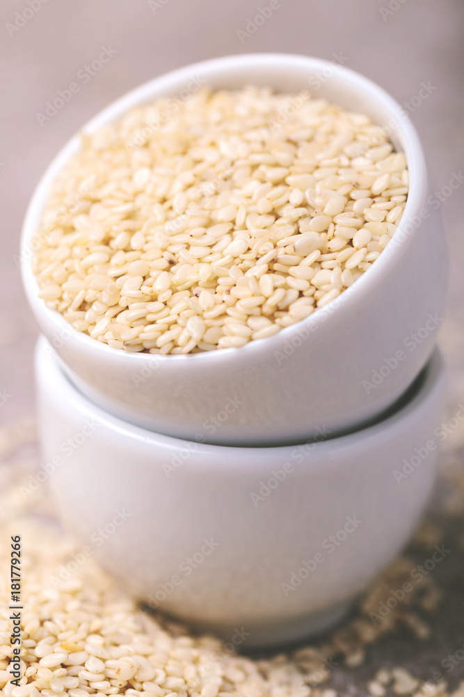 White sesame seeds. Copy space. Horizontal view. White sesame seeds. Copy space. Horizontal view.