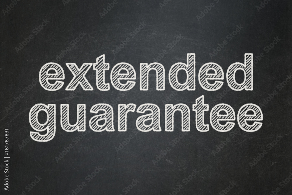 Obraz premium Insurance concept: text Extended Guarantee on Black chalkboard background