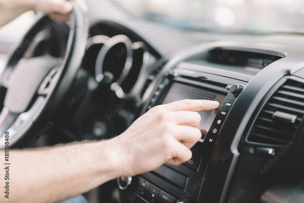 Man Using Gps Navigation System In Car to travel