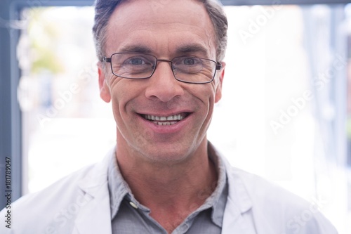 Portrait of smiling dentist with eyeglasses