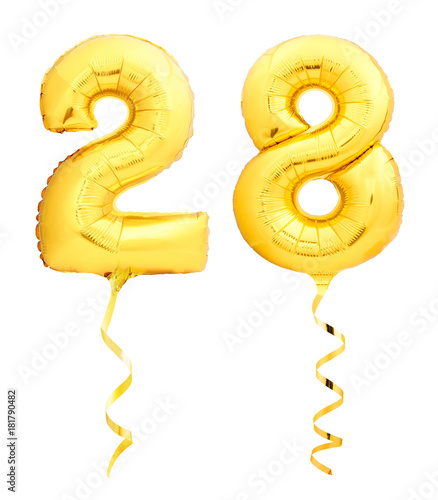 Golden number 28 twenty eight made of inflatable balloon with ribbon isolated on white