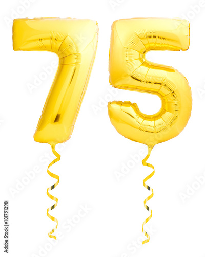 Golden number seventy five 75 made of inflatable balloon with ribbon on white photo