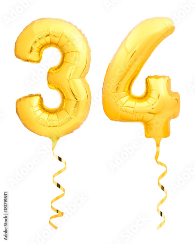 Golden number thirty four 34 made of inflatable balloon photo