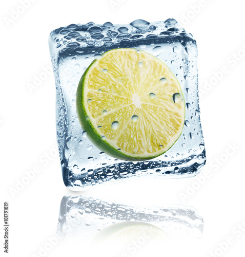 Lime frozen in ice cube, isolated