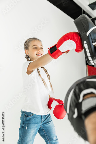 father and daughter boxing together