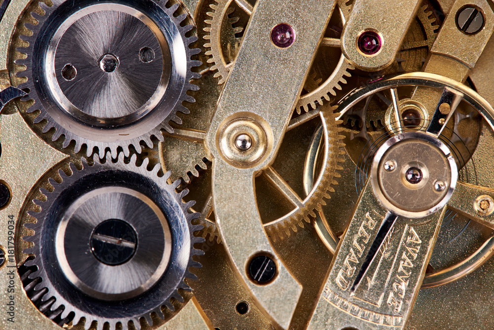 Altes Uhrwerk einer Taschenuhr mit Zahnrädern Altes Uhrwerk einer Taschenuhr mit Zahnrädern