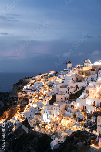 View of famous white buildings of Oia town on cliff in Santorini, Greece © Andrew Bayda