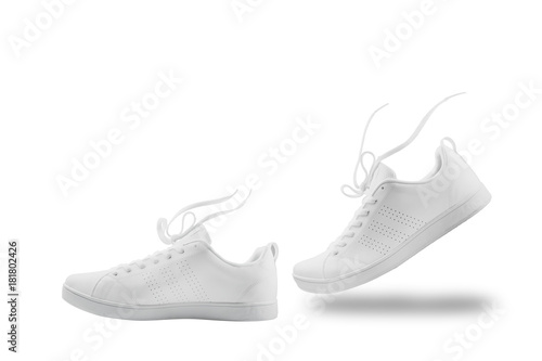 Pair of White sneaker composition like walking and floating rope isolated on white background with clipping path