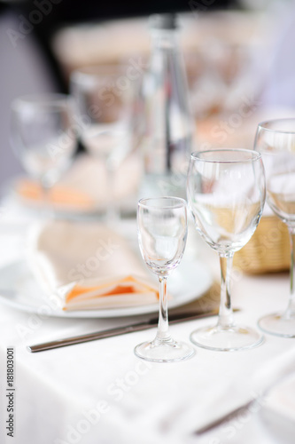 Beautiful table set with two glasses for wedding reception