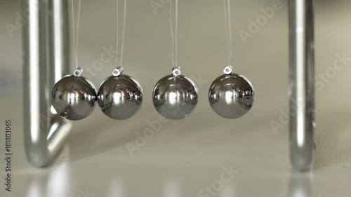 slow motion macro newtons cradle