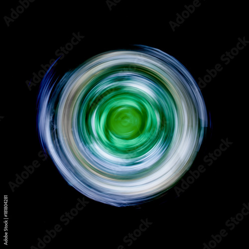 Green spinning wheel vortex of light