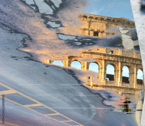 World famous Coliseum reflected on a pond photo