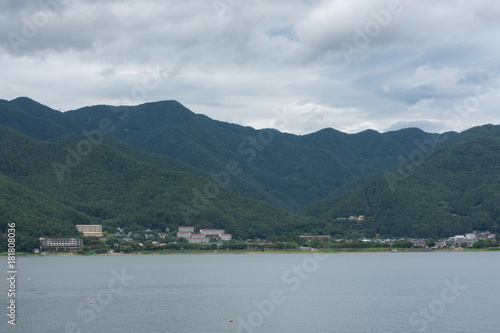 The beauty of the forest mountains above the lake in Japan