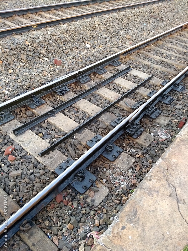 Indian railway track with stone in railway station Indian railway track with stone in railway station