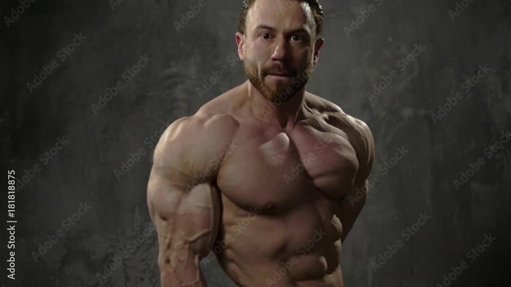 Man showing his muscular body Man showing his muscular body