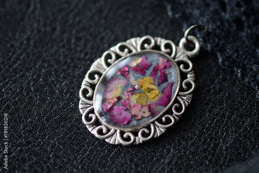 Black lace choker with a pendant made of epoxy resin and rose petals Black lace choker with a pendant made of epoxy resin and rose petals