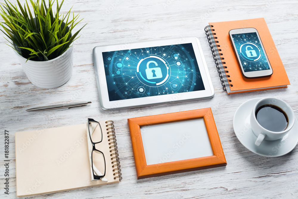 Web security and technology concept with tablet pc on wooden table Web security and technology concept with tablet pc on wooden table