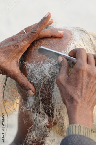 during the kumba melah milions of pilgrims come to dip and purify themself in the holy water of the ganges river photo